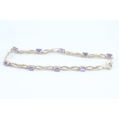 110 - A 9CT GOLD AMETHYST BRACELET Weight: 4.4 gms