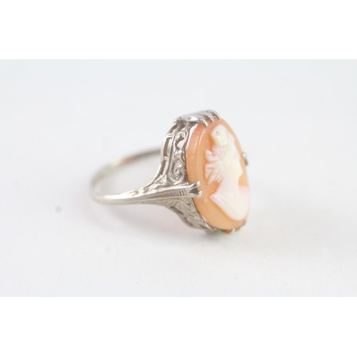 113 - A 9CT GOLD SHELL CAMEO DRESS RING Weight: 3 gms