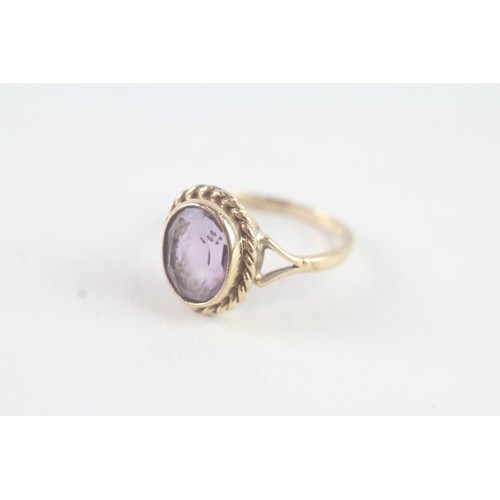 115 - A 9CT GOLD VINTAGE AMETHYST DRESS RING Weight: 3.2 gms