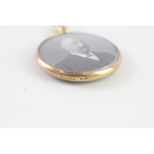 112 - A 9CT GOLD ANTIQUE DOUBLE SIDED LOCKET WITH PHOTOS Weight: 4.4 gms