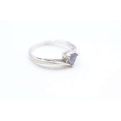 120 - A 9CT WHITE GOLD TRILLIANT CUT IOLITE DRESS RING Weight: 2.7gms