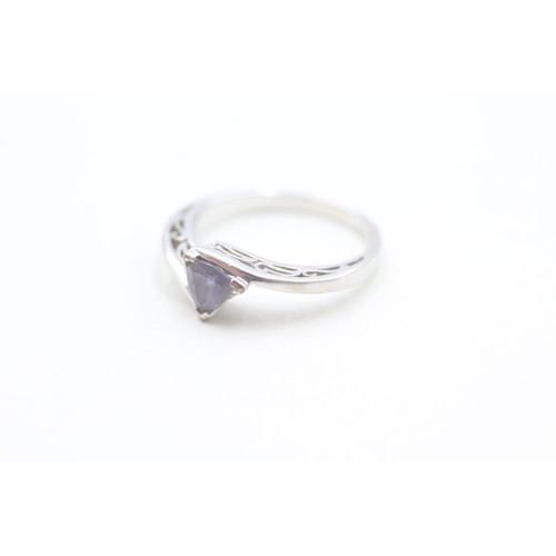 120 - A 9CT WHITE GOLD TRILLIANT CUT IOLITE DRESS RING Weight: 2.7gms