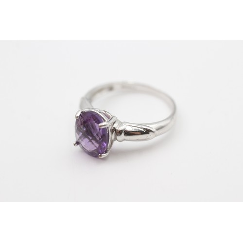 122 - A 9CT WHITE GOLD AMETHYST SINGLE STONE RING Weight: 3.1gms