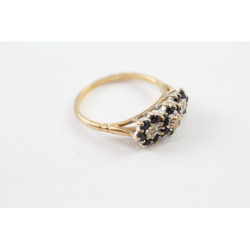 121 - A 9CT GOLD DIAMOND AND SAPPHIRE SET CLUSTER TRILOGY RING Weight: 2.7gms