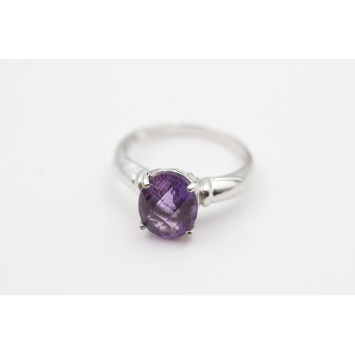 122 - A 9CT WHITE GOLD AMETHYST SINGLE STONE RING Weight: 3.1gms