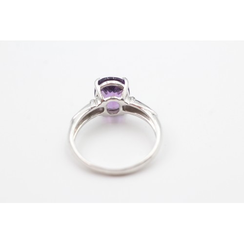 122 - A 9CT WHITE GOLD AMETHYST SINGLE STONE RING Weight: 3.1gms