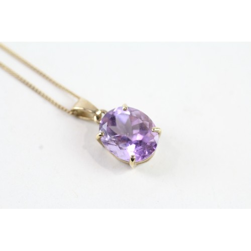 130 - A 9CT GOLD OVAL CUT AMETHYST PENDANT NECKLACE Weight: 3.3 gms