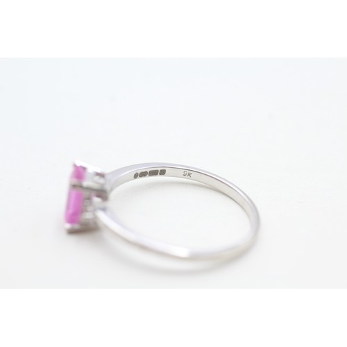 146 - A 9CT WHITE GOLD DIAMOND ACCENTED PINK GEMSTONE SET DRESS RING Weight: 2.1gms