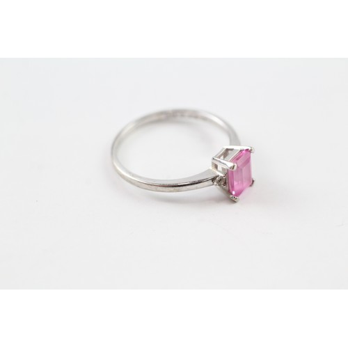 146 - A 9CT WHITE GOLD DIAMOND ACCENTED PINK GEMSTONE SET DRESS RING Weight: 2.1gms