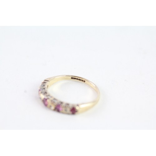 157 - A 9CT GOLD RUBY AND DIAMOND HALF ETERNITY RING Weight: 1.7 gms