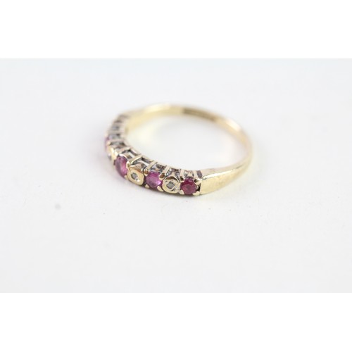 157 - A 9CT GOLD RUBY AND DIAMOND HALF ETERNITY RING Weight: 1.7 gms