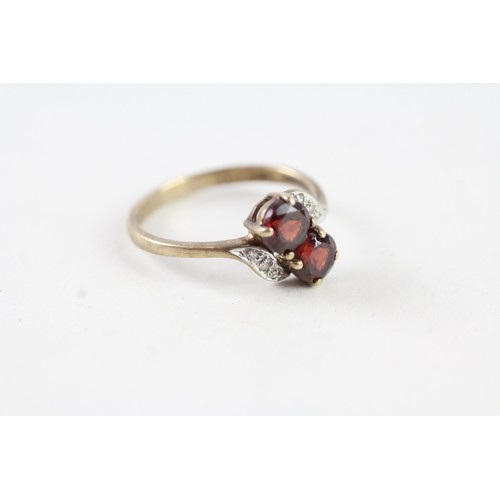 159 - A 9CT GOLD VINTAGE STYLE GARNET AND DIAMOND DRESS RING Weight: 1.7 gms