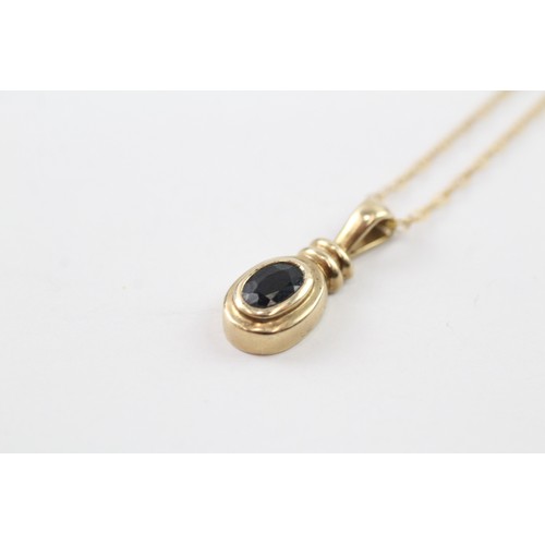 155 - A 9CT GOLD OVAL CUT SAPPHIRE PENDANT NECKLACE Weight: 1.9gms