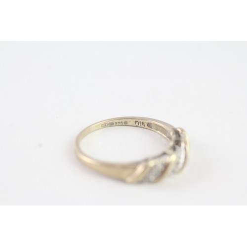 164 - A 9CT GOLD DIAMOND ETERNITY RING Weight: 2.2 gms