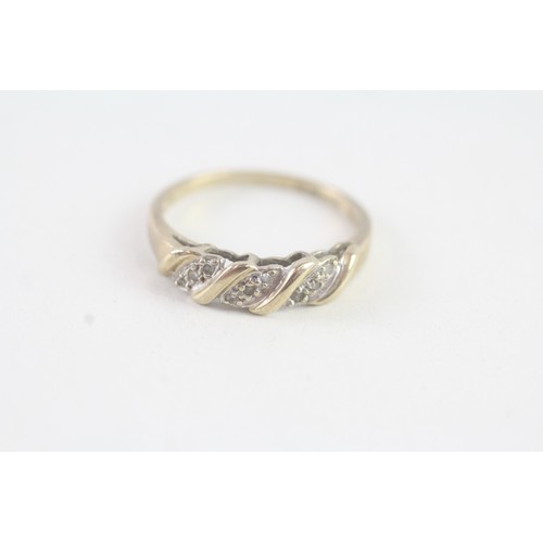 164 - A 9CT GOLD DIAMOND ETERNITY RING Weight: 2.2 gms