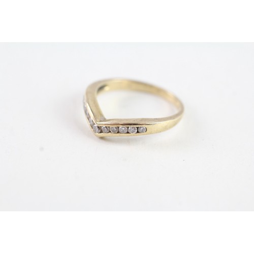 161 - A 9CT GOLD DIAMOND WISHBONE RING Weight: 1.8 gms