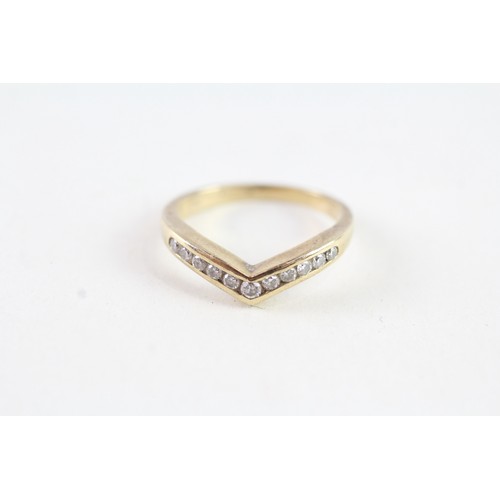 161 - A 9CT GOLD DIAMOND WISHBONE RING Weight: 1.8 gms