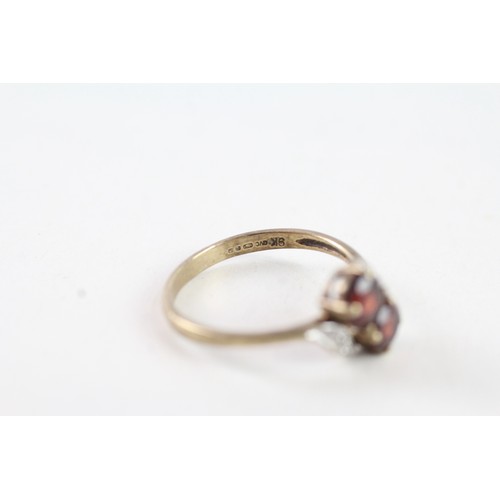 159 - A 9CT GOLD VINTAGE STYLE GARNET AND DIAMOND DRESS RING Weight: 1.7 gms