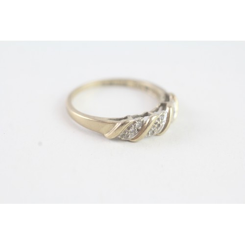 164 - A 9CT GOLD DIAMOND ETERNITY RING Weight: 2.2 gms