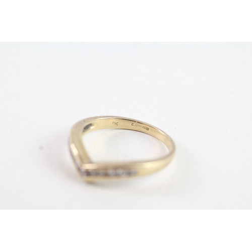 161 - A 9CT GOLD DIAMOND WISHBONE RING Weight: 1.8 gms