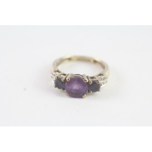 139 - A 9CT GOLD AMETHYST, SAPPHIRE AND DIAMOND DRESS RING Weight: 2.6 gms