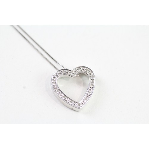 137 - A 9CT GOLD DIAMOND HEART SHAPED PENDANT NECKLACE Weight: 2.6 gms