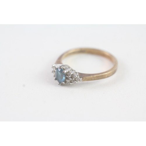 141 - A 9CT GOLD BLUE TOPAZ AND DIAMOND DRESS RING Weight: 2.4 gms