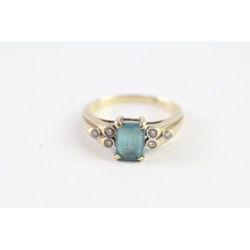 136 - A 9CT GOLD BLUE TOPAZ AND DIAMOND DRESS RING Weight: 2.4 gms