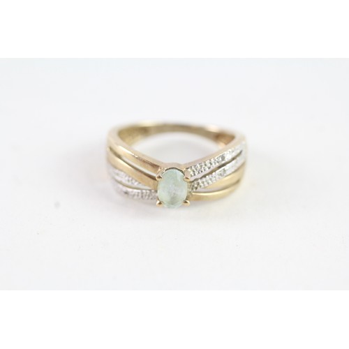 138 - A 9 CT GOLD BLUE GEMSTONE AND DIAMOND DRESS RING Weight: 2.8 gms