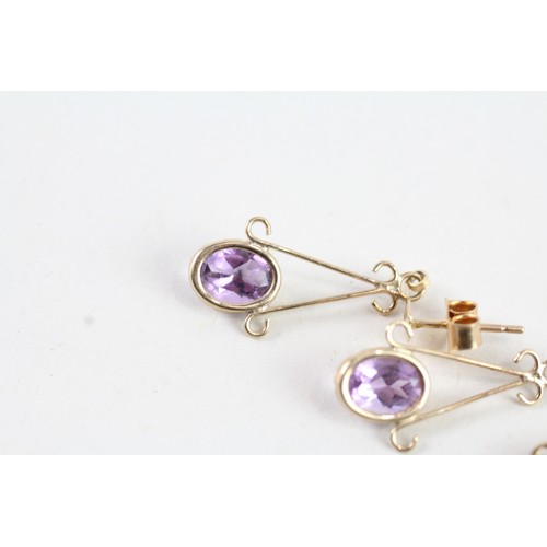 168 - A 9CT GOLD AMETHYST DROP EARRINGS AND PENDANT SET Weight: 2.3 gms