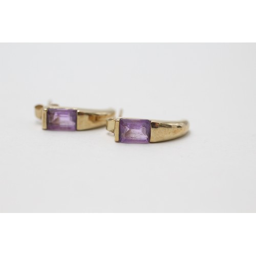 170 - A PAIR OF 9CT GOLD AMETHYST HALF HOOP EARRINGS Weight: 1.8gms