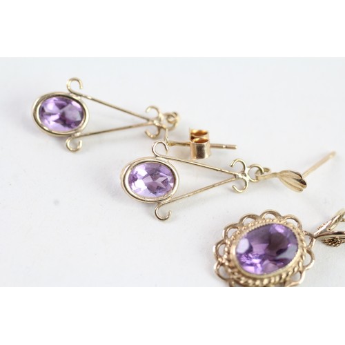 168 - A 9CT GOLD AMETHYST DROP EARRINGS AND PENDANT SET Weight: 2.3 gms