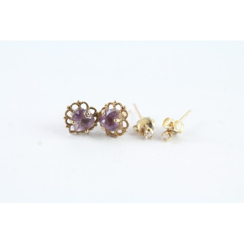 176 - TWO PAIRS OF 9CT GOLD AMETHYST AND DIAMOND STUD EARRINGS (2) Weight: 1.4 gms