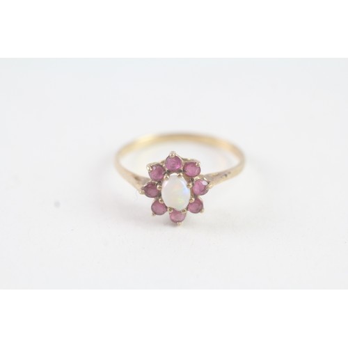 179 - A 9CT GOLD VINTAGE OPAL AND RUBY CLUSTER RING Weight: 1.4 gms