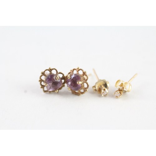 176 - TWO PAIRS OF 9CT GOLD AMETHYST AND DIAMOND STUD EARRINGS (2) Weight: 1.4 gms