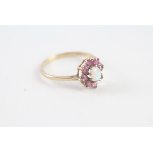 179 - A 9CT GOLD VINTAGE OPAL AND RUBY CLUSTER RING Weight: 1.4 gms