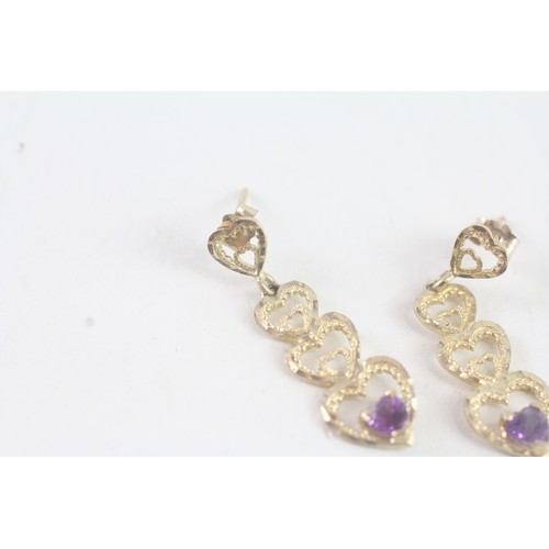 180 - A PAIR OF 9CT GOLD AMETHYST HEART SHAPED DROP EARRINGS Weight: 1.6 gms