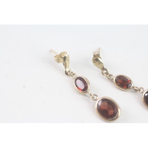 181 - A PAIR OF 9CT GOLD GARNET DROP EARRINGS Weight: 1.4 gms