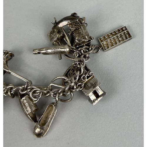 187 - TWO CHINESE SILVER CHARM BRACELETS Weight: 63gms