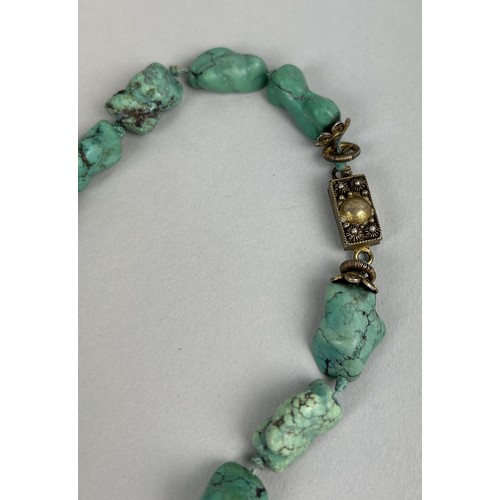 198 - A CHINESE TURQUOISE COLOURED STONE NECKLACE