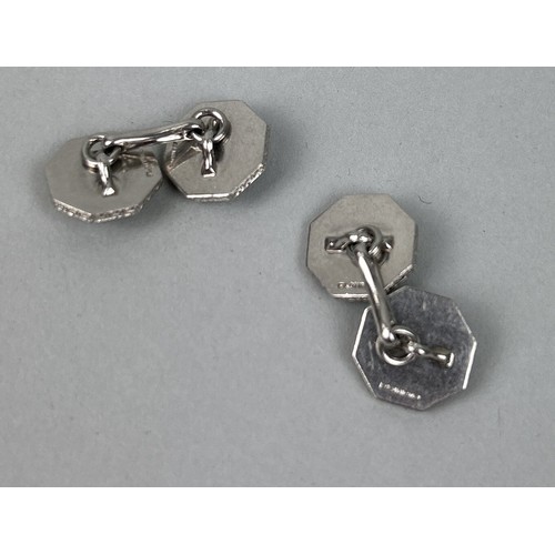 211 - A PAIR OF PLATINUM ART-DECO CUFFLINKS Weight: 11.9 gms