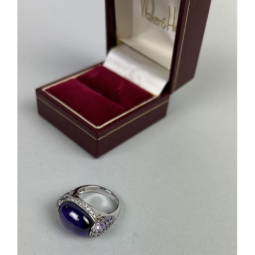 206 - WALKER AND HALL: A 925 SILVER RING SET WITH PURPLE STONE In box.