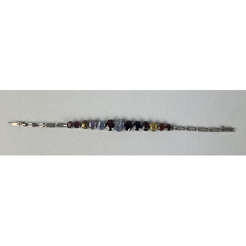 216 - A SILVER BRACELET SET WITH COLOURED STONES Weight: 13.8gms