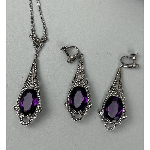 224 - A SILVER NECKLACE AND EARRINGS SET WITH PURPLE STONES (3) Weight: 23gms With box.