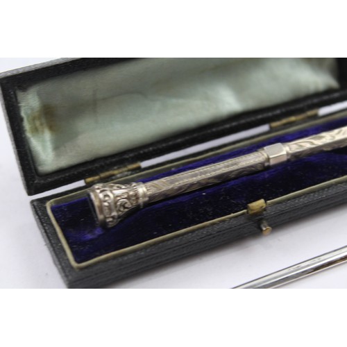 231 - A .800 AND .925 STERLING SILVER PROPELLING PENCIL AND LETTER OPENER