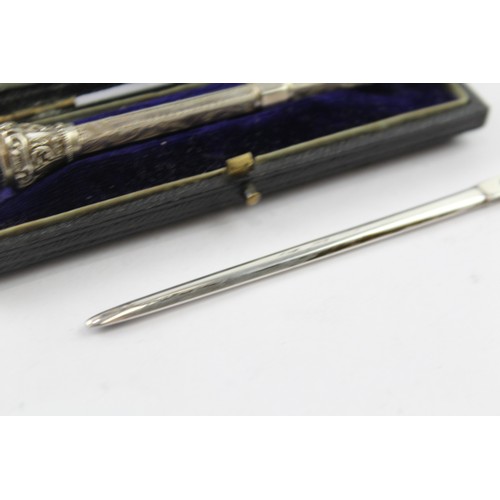 231 - A .800 AND .925 STERLING SILVER PROPELLING PENCIL AND LETTER OPENER