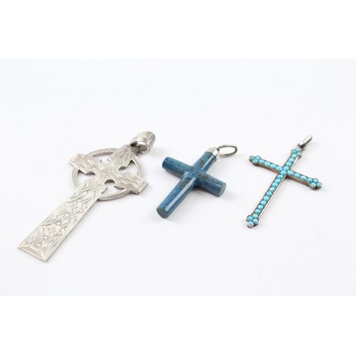 238 - THREE ANTIQUE SILVER CROSS PENDANTS (3)