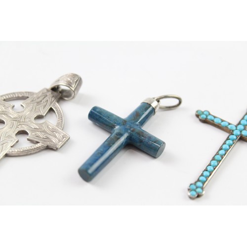 238 - THREE ANTIQUE SILVER CROSS PENDANTS (3)