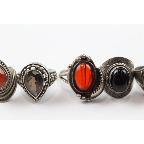 235 - A COLLECTION OF STERLING SILVER GEMSTONE RINGS INCLUDING ONYX AND SMOKY QUARTZ