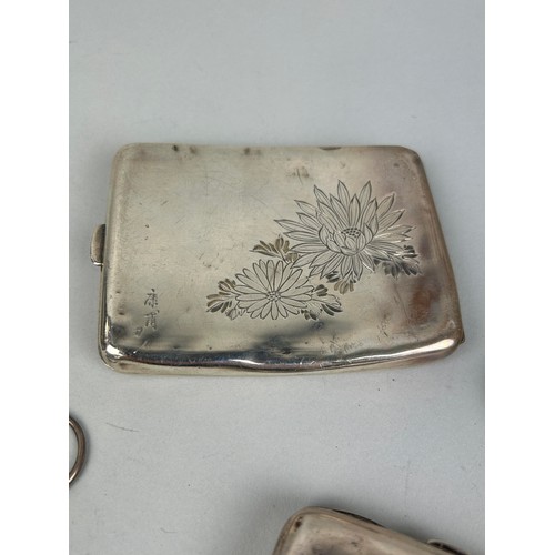 255 - A GROUP OF FIVE CIGARETTE CASE AND TWO SILVER PURSES Total weight: 540gms (please note the two purse... 